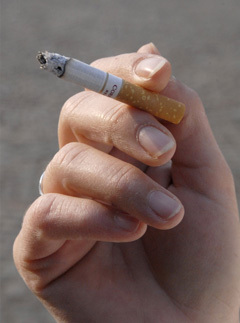 Woman holding a cigarette