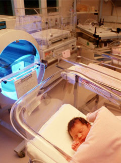Baby in hospital unit