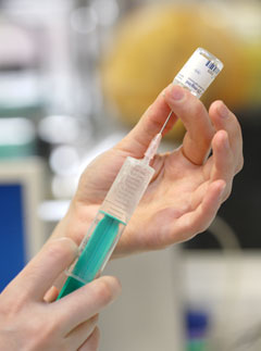 A nurse administering an injection