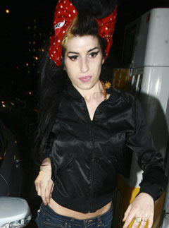 Marie Claire celebrity photos: Amy Winehouse on her way home from Limehouse police station