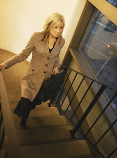 Marie Claire News: Woman climbing stairs