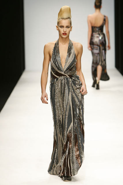 A model wears Issa A/W 2010 - London fashion week - catwalk pictures
