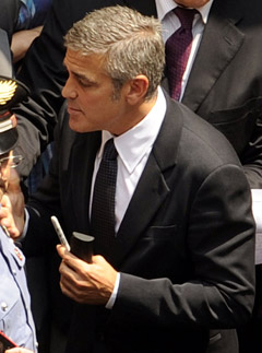 George Clooney - George Clooney causes chaos at Italian fraud trial - Celebrity News - Marie Claire