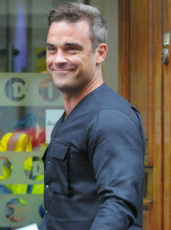 Robbie Williams - Robbie Williams battling mystery illness - Take That - Gary Barlow - Celebrity News - Marie Claire