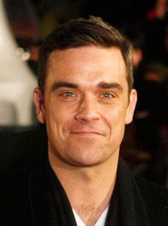 Take That singer Robbie Williams has revealed he injects himself with a libido boosting hormone twice a week, after being told by doctors he had the ... - Robbie-Williams-LP7