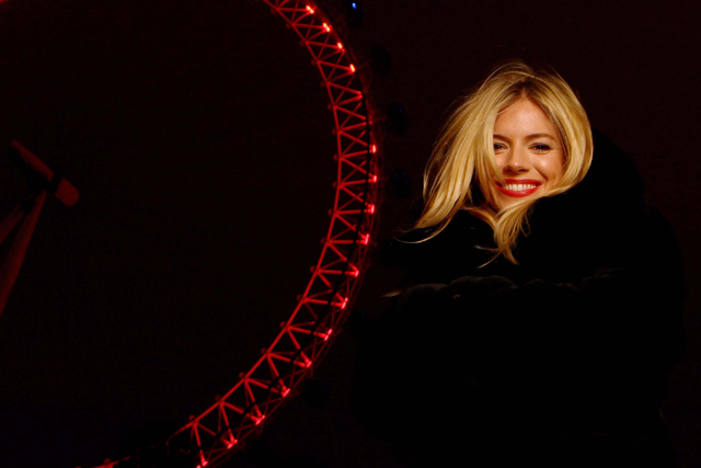 Sienna Miller turns the London Eye (RED)? for World AIDS Day