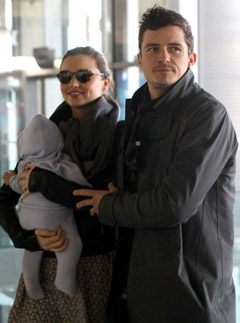Miranda Kerr Orlando Bloom - Miranda Kerr and Orlando Bloom jet off with baby Flynn - MIranda Kerr - Orlando Bloom - Balenciaga - Paris Fashion Week - Marie Claire - Marie Clarie UK