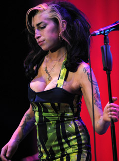 Amy Winehouse - Amy Winehouse cancels comeback gigs after disastrous Belgrade performance - Amy Winehouse tour - Marie Claire - Marie Claire UK