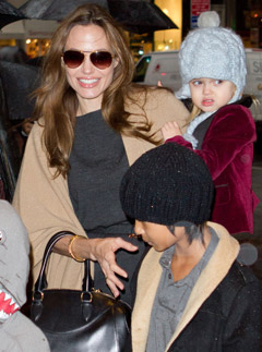 Angelina Jolie and Brad Pitt take children shopping in New York