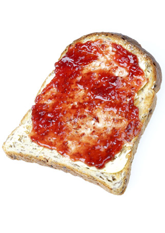 Jam on toast - Piece of brown toast with jam and no butter - 100 Calorie Snacks - Low Calorie Snacks - Marie Claire - Marie Clarie UK