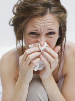 Woman Sneezing