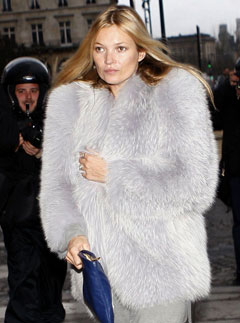 Kate Moss wearing a fur coat out and about in Paris