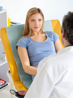 Woman in doctors surgery