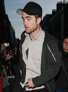 Robert Pattinson at his 26th birthday party at Claridges in London