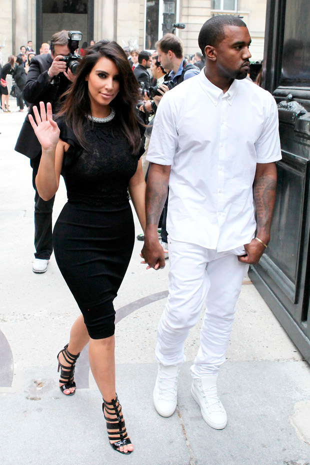 Kim Kardashian and Kanye Wes at the Valentino Haute Couture autumn/winter 2012 show in Paris