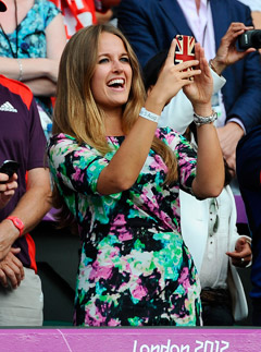 Kim Sears cheers Andy Murray on as he wins an Olympic gold medal in the tennis