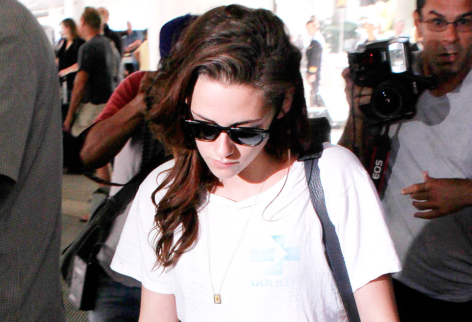 Kristen Stewart returns from Paris Fashion Week