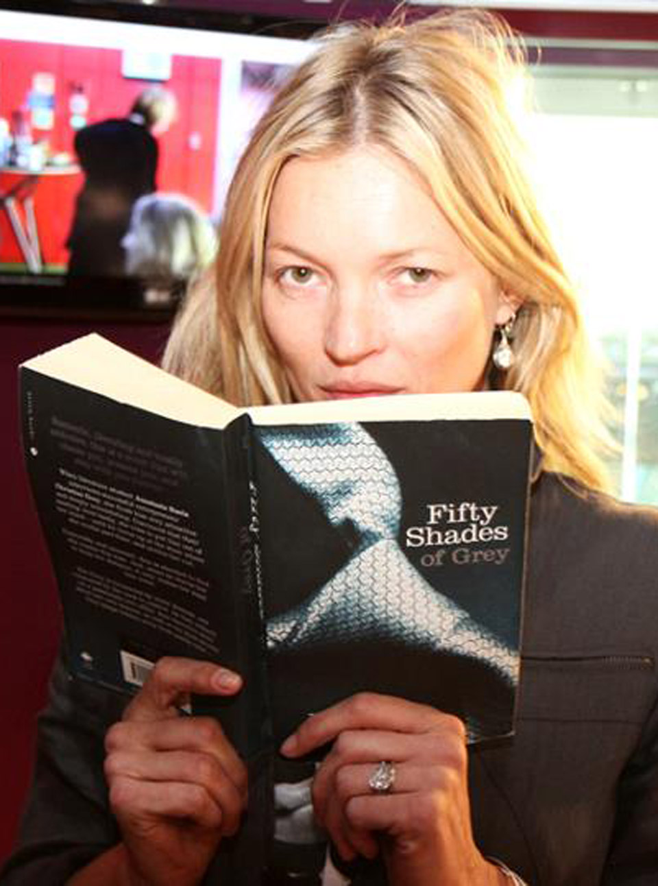 Kate Moss reads Fifty Shades of Grey