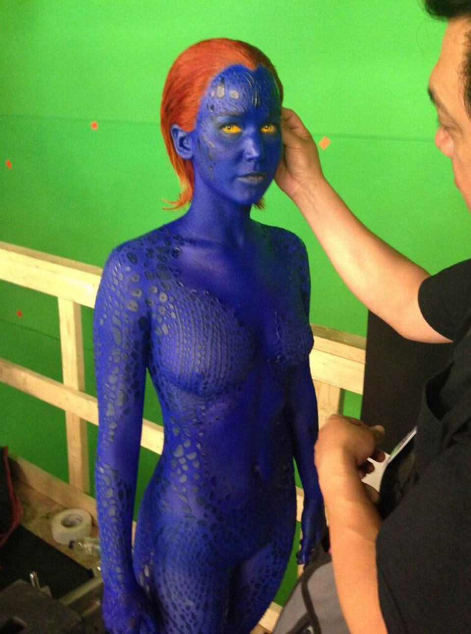Jennifer Lawrence is painted in blue bodypaint for X-Men