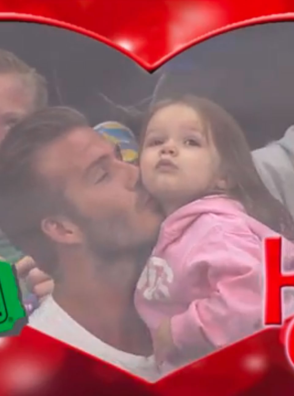 David Beckham kisses Harper on the KissCam