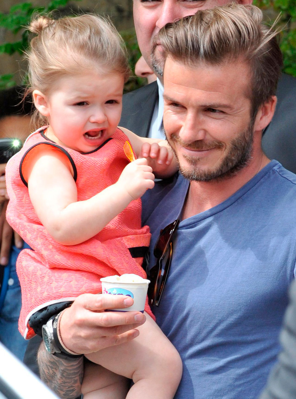 David Beckham carries Harper Beckham in London