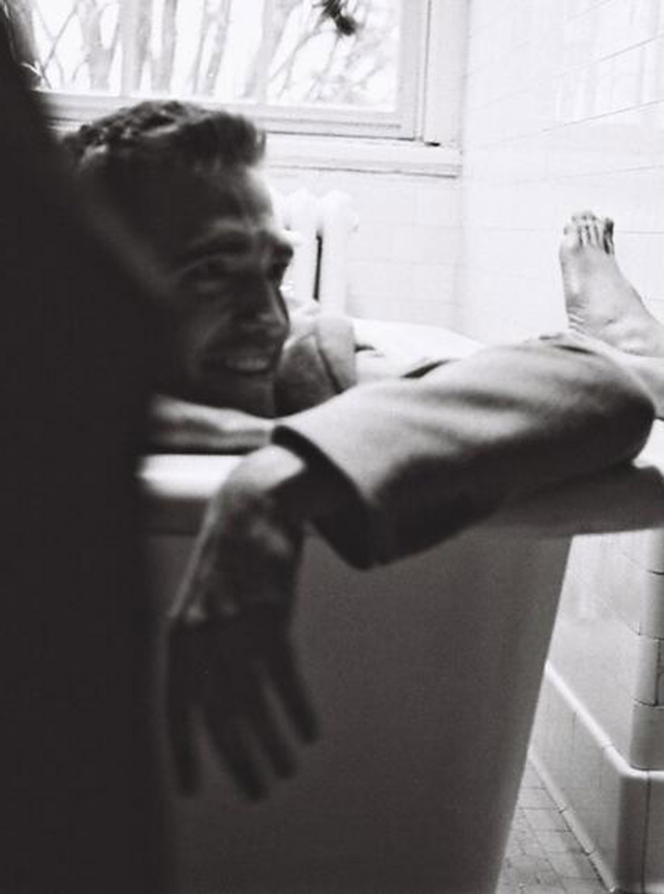 Robert Pattinson in a bath for Dior Homme   campaign