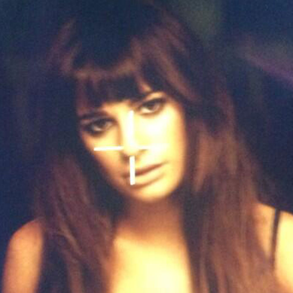 Lea Michele smoulders in her debut music video