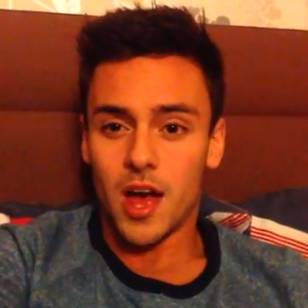 Tom Daley talks to the camera in a personal video message