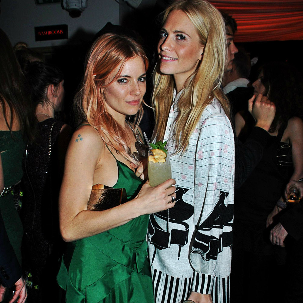 Sienna Miller and Poppy Delevinne at the Playboy 60th Anniversary party, 2013