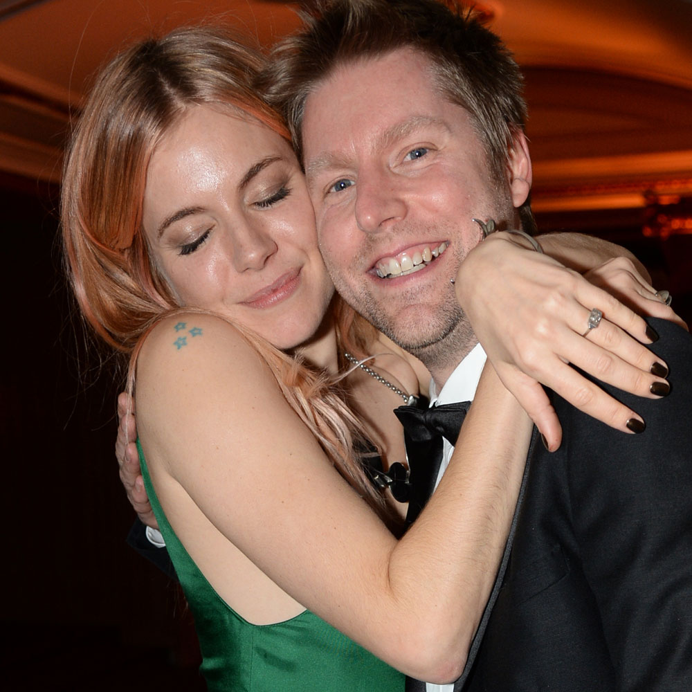 sienna miller cosies up to christopher bailey at the bfas 2013