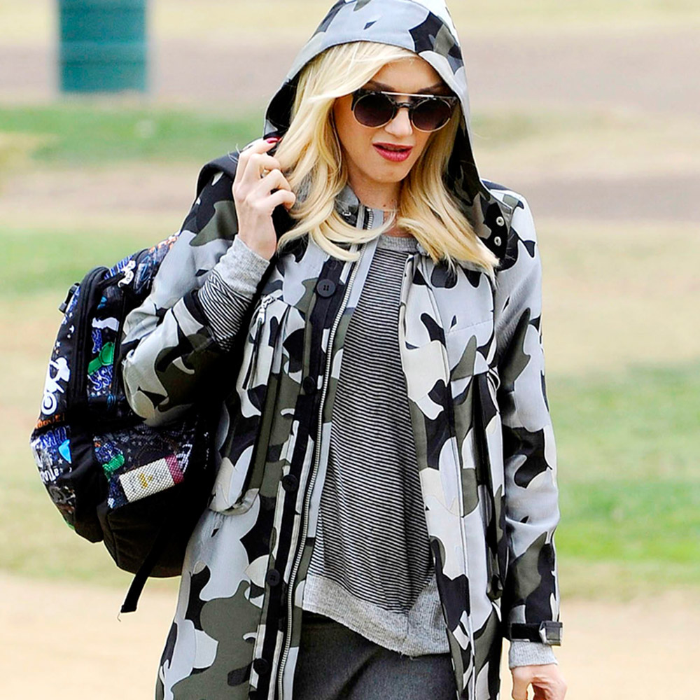 Gwen Stefani out in London in a Whistles Camo coat 