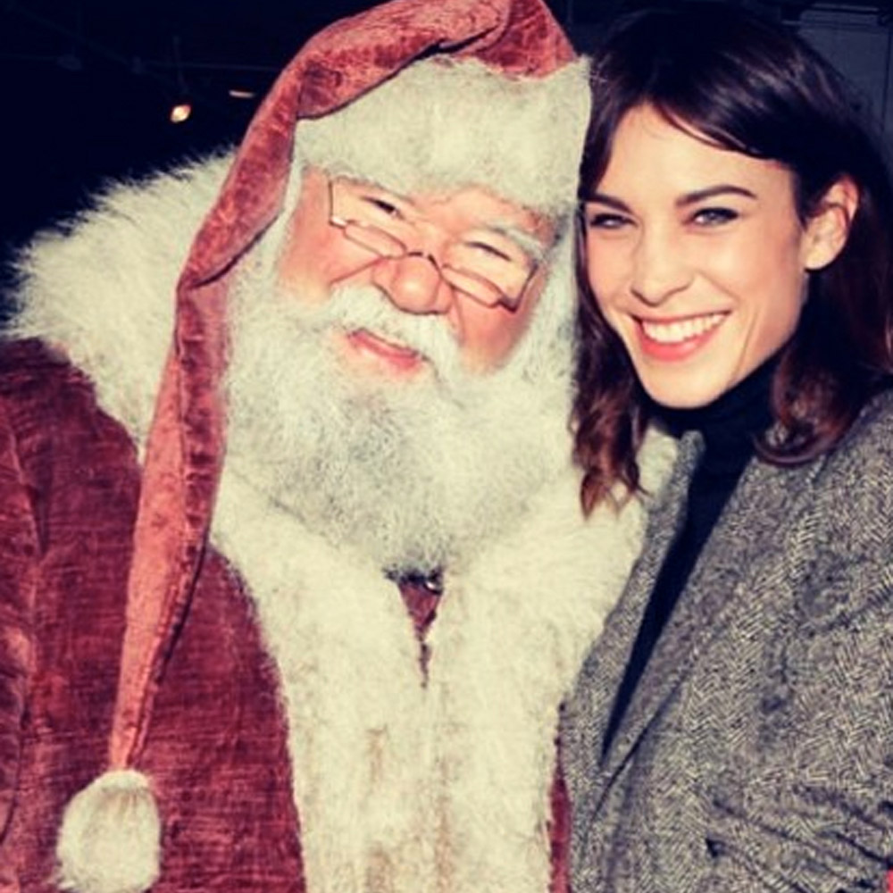 Alexa Chung and Father Christmas at a party in New York