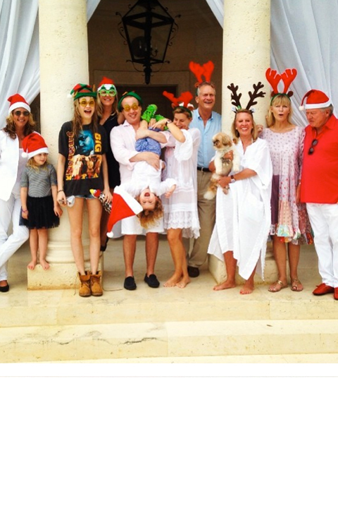 Cara Delevingne and her family on holiday at Christmas Cara Delevingne and her family on holiday at Christmas