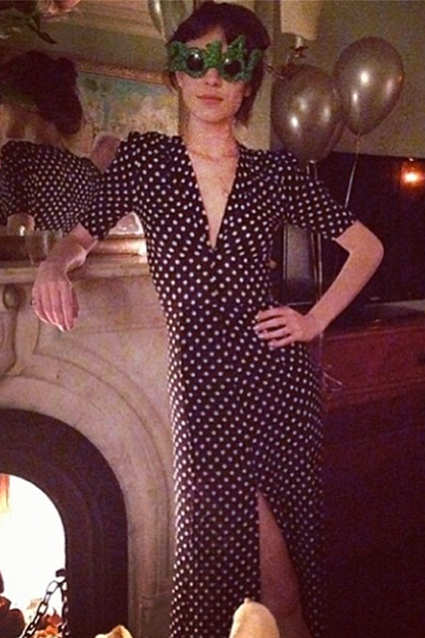 Alexa Chung poses by the fire on NYE Alexa Chung poses by the fire on NYE