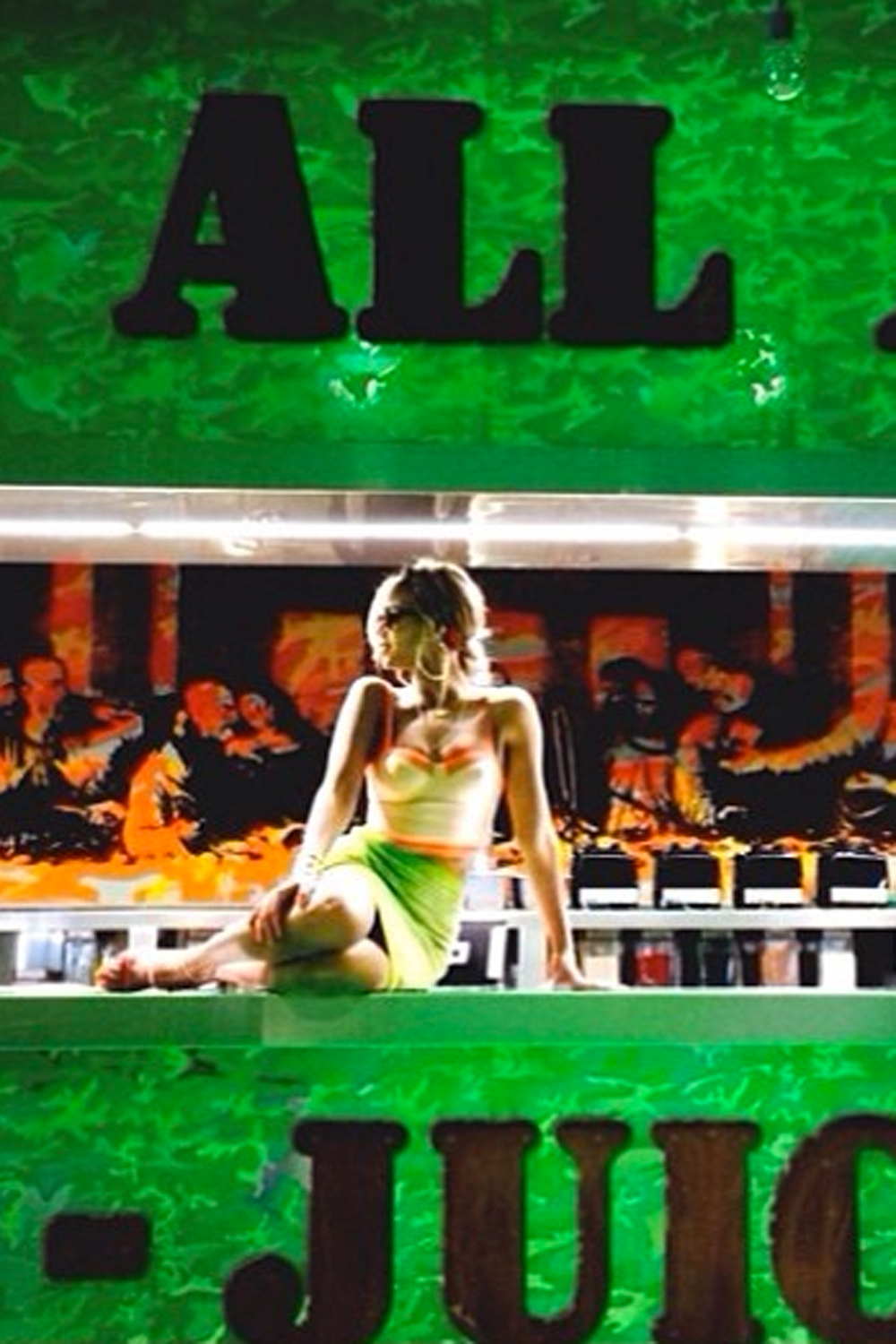 Beyonce poses in front of an Andy Warhol mural of the Last Supper Beyonce poses in front of an Andy Warhol mural of the Last Supper