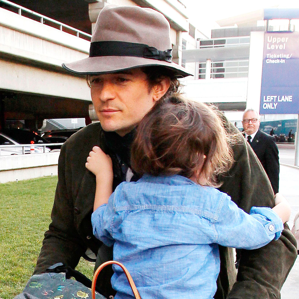 Orlando Bloom carrying son Flynn Bloom
