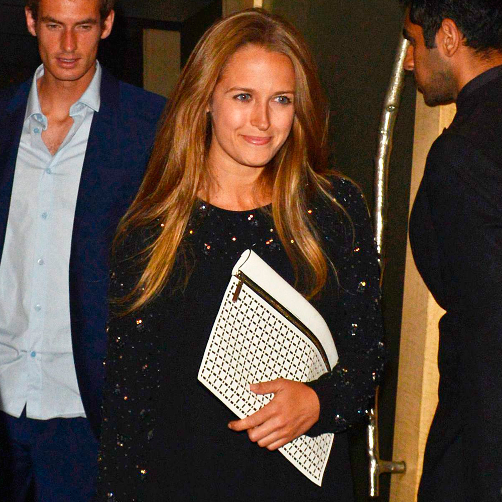 Kim Sears holding a Victoria Beckham clutch