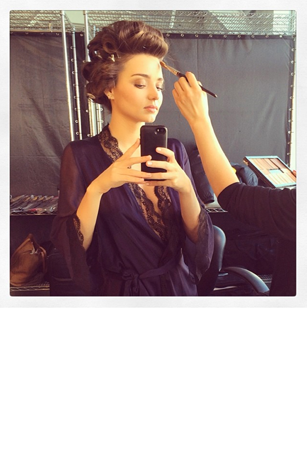 Miranda Kerr having her make up done behind the scenes Miranda Kerr having her make up done behind the scenes