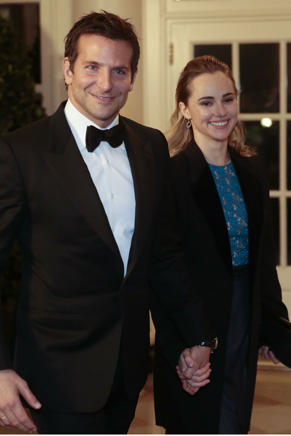 Bradley Cooper and Suki Waterhouse attend the White House State Dinner. Bradley Cooper and Suki Waterhouse attend the White House State Dinner.