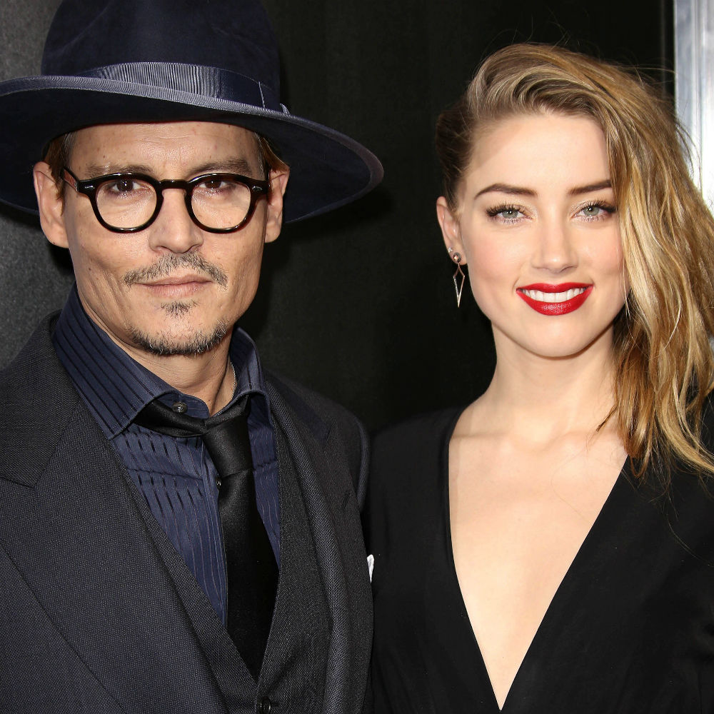 Johnny Depp and Amber Heard at the 3 Days to Kill premiere