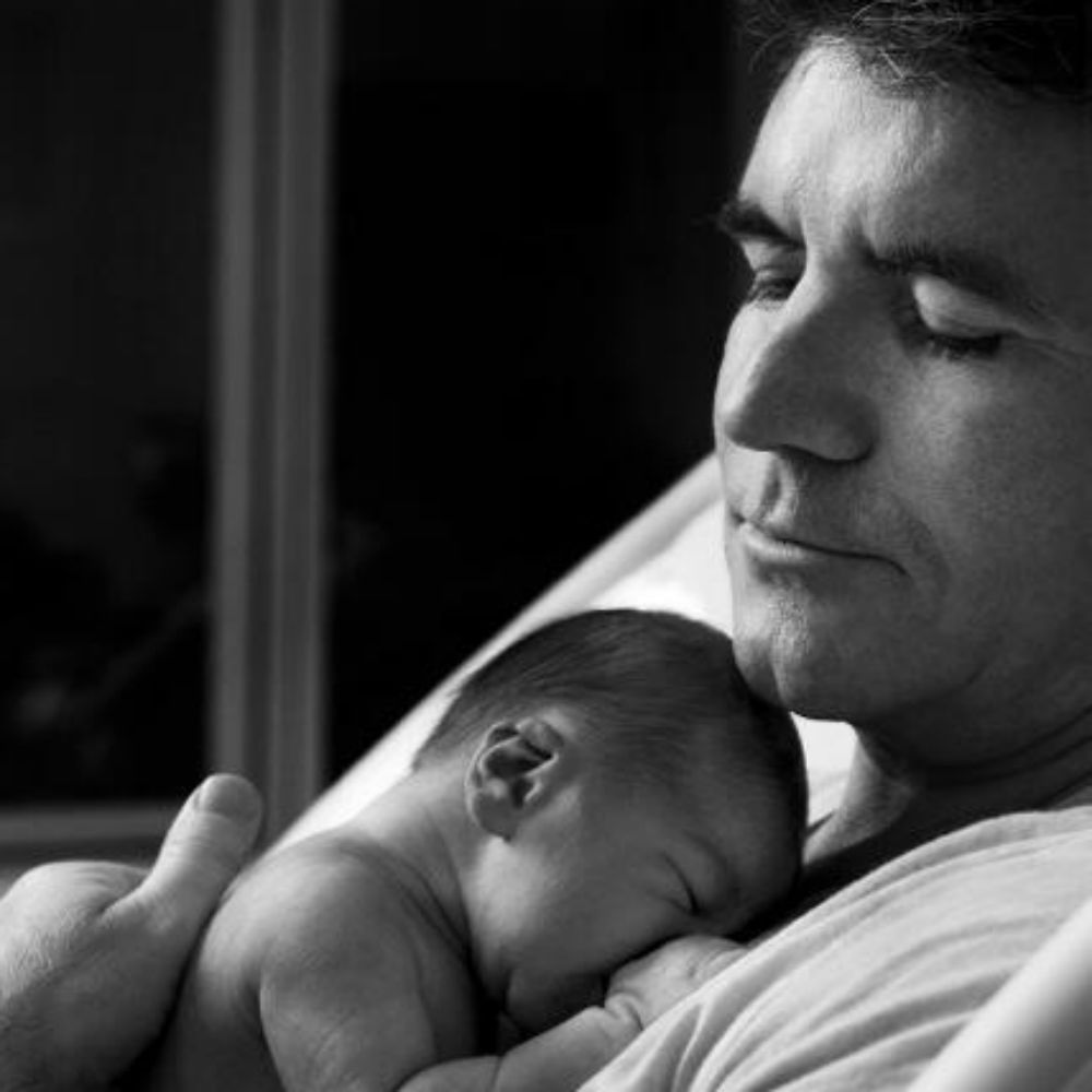 Simon Cowell shares baby pics of his son Eric via Twitter..