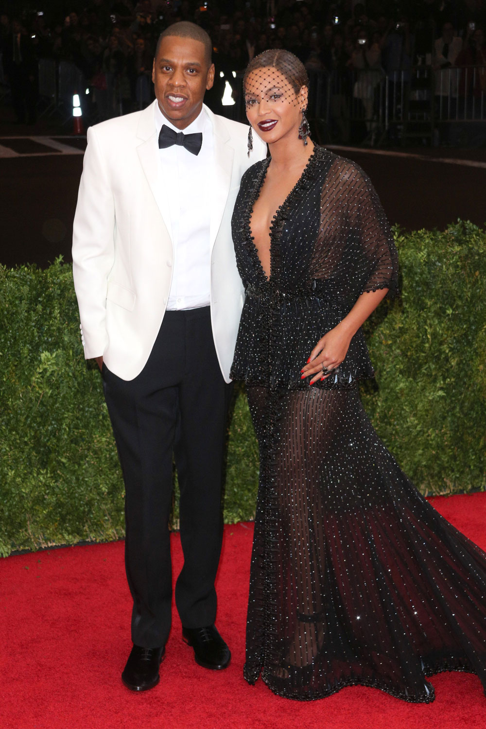 Beyonce in a Givenchy dress at the 2014 Met Ball with husband Jay Z Beyonce in a Givenchy dress at the 2014 Met Ball with husband Jay Z