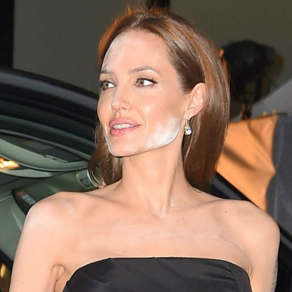 Angelina Jolie powder makeup on her face