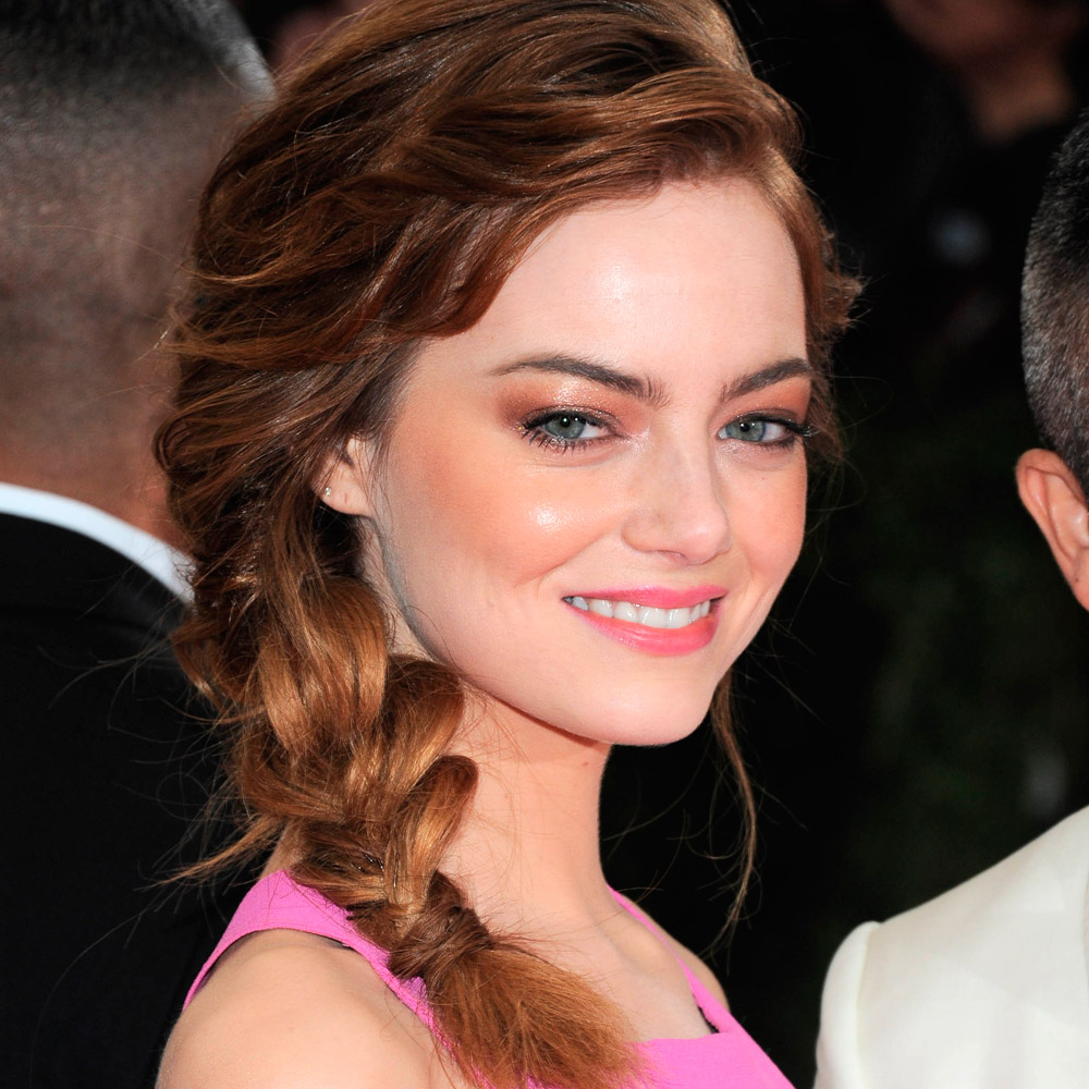 Emma Stone wearing a side plait to the Met Ball 2014