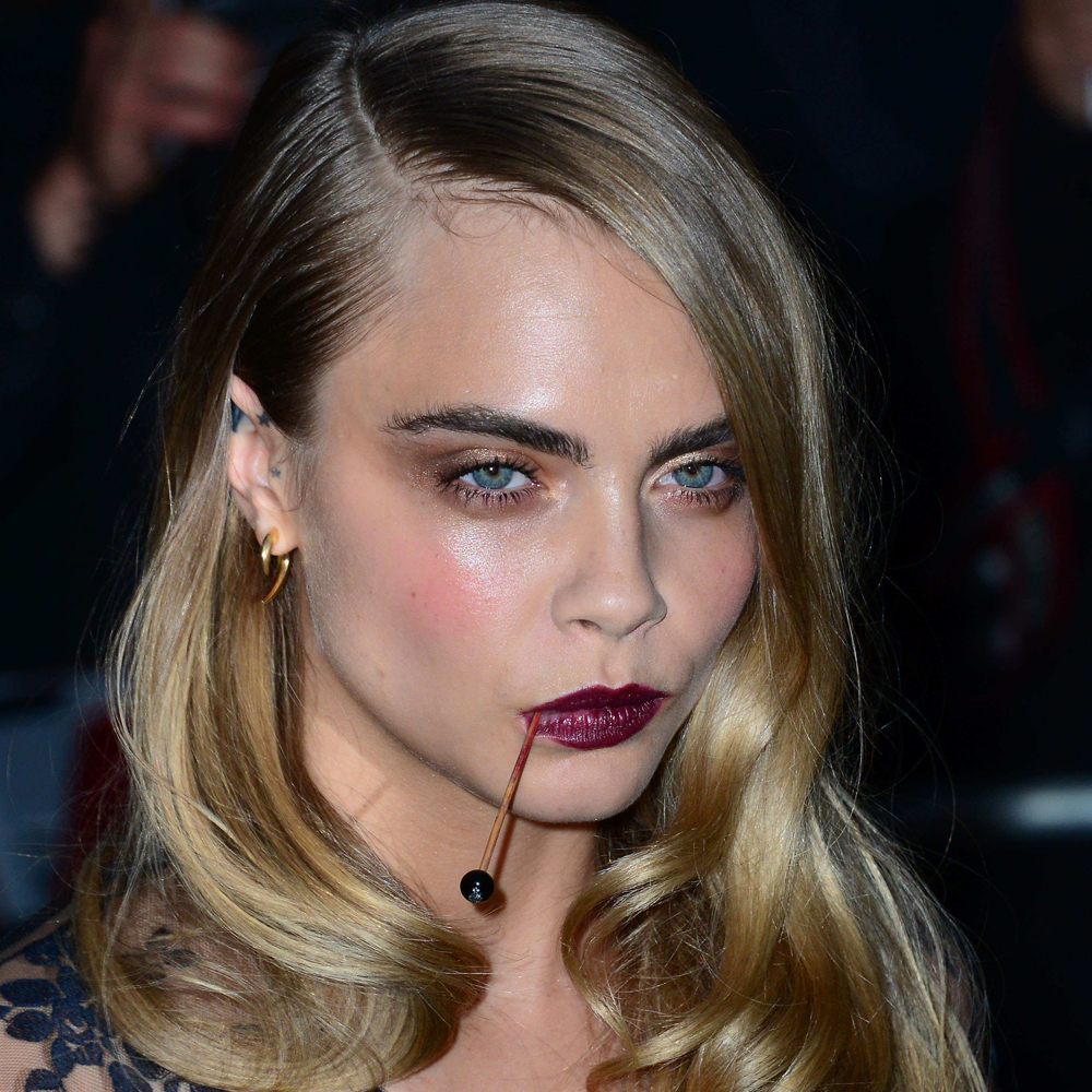 Cara Delevingne Debuts A Bizarre Mouth Accessory At The Gq Men Of The